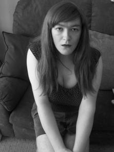Anna Secret Poet B/W Couch Cleavage